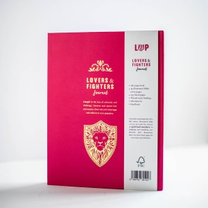 Lovers & Fighters Christian Journal inside showing an illustrated page and a linned page for your own notes.  The journal is stood up open.  They make perfect christian gifts for many occasions 