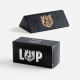 Black box which houses the Magentic wooden card stand shown next to a black wooden card stand embossed with the L&P logo