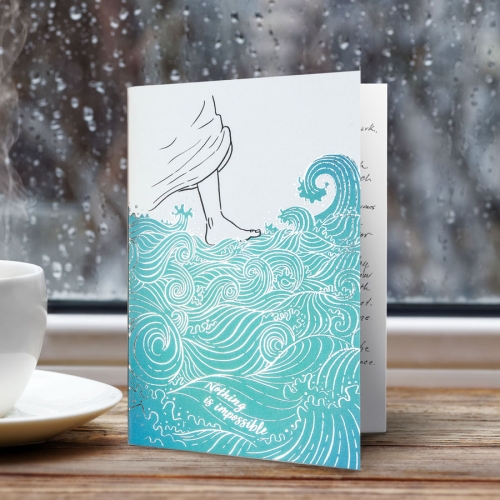 greeting cards with matching illustrated envelopes featuring silver foil. This card is shown stood on a wood shelf next to two little pots