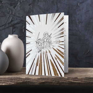 Christian greeting cards with matching illustrated envelopes featuring silver foil.  This card is shown stood on a wood shelf next to two little pots and is based on the verse from Deuteronomy 31:6